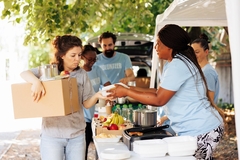 Image people distributing food to the needy