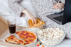 Image Person overeating on junk food