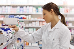 Image Woman checking health claims on supplements