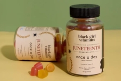 Image Gummies in jar falling out on surface