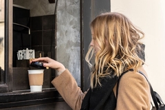 Image woman getting cup
