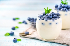 Image Yogurt in a glass with blueberries.