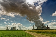 Image Fossil fuels next to a farm.