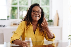 Image Woman taking an omega-3 supplement