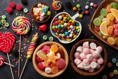 Image Colorful candy including lollipops, jellies and sweets.