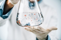 scientist holding test tube