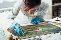 Image woman restoring painting