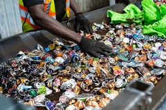 A person working with garbage sorting