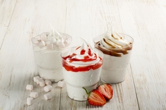 Image soft serve ice cream with sauce in three cups