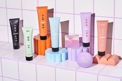 Image skin care products on a tile shelf