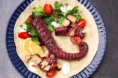octopus tentacle dish made from fungi on a plate