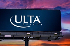 Image billboard with Ulta logo on it, at sunset