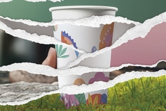 Image A paper cup with a flower design on it