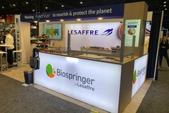 Image a trade show booth with a white counter