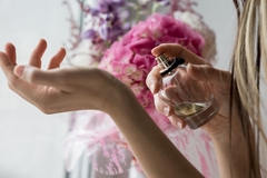 perfume sprayed on forearm