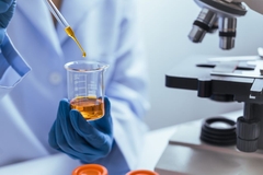 Image scientist creating cosmetics in lab