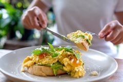 Image A plate of vegan scrambled eggs.