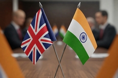Image UK and India flag on a conference table