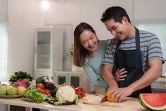 Image Man and woman cooking healthy meal