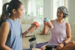 Two women with protein shakes