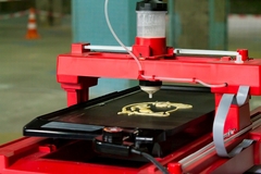 Image red colored 3d printer printing pancake dough