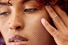 Image woman with data analysis points across face