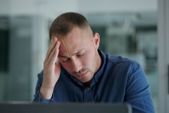 Image man in office with brain fog