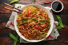 Image noodles in a white bowl with chopsticks