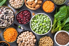 Image Legumes, beans, lentils, nuts, broccoli, spinach and seeds.