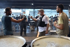 Image José Andrés fist bumps with WCK team member