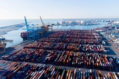 Image Cargo containers at a port.