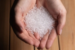 Image A handful of white material in hands