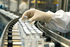 Image Pharmaceuticals on conveyor belt.