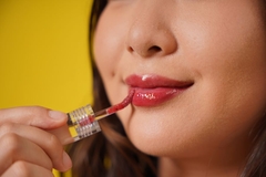 Image woman using lip makeup