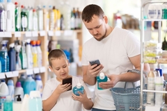 father and son making use of connected packaging