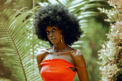 Image woman standing in the rainforest in Brazil
