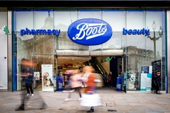store facade with people walking