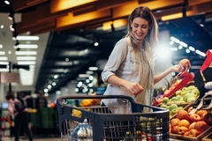 Image Women buying vegetables in a supermarket.