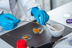 Image Scientist doing quality check on spice