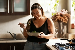 Image Woman eating a salad