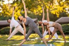 Image People doing yoga outside