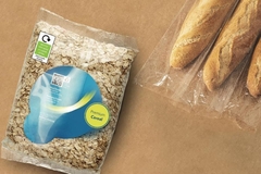 Image A bag of cereal next to bag of bread