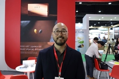 head shot of jimmy, bald with glasses, and beard