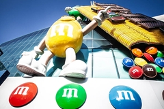 Image Mars M&M'S sign outside office.