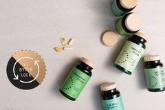 brown and green supplement bottles