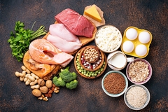 Image eggs meat and beans on black background