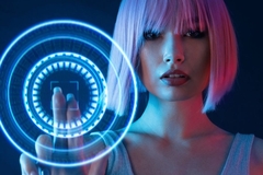 woman with pink hair tapping holographic interface technology
