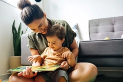 Mother and child reading a book