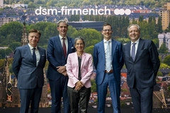 Image four men and a woman in suits at building innauguration