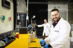 Two people in lab coats